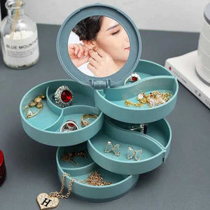 4-layer rotating jewelry organizer box by My Store with mirrors, transparent compartments, and a compact, stylish design.