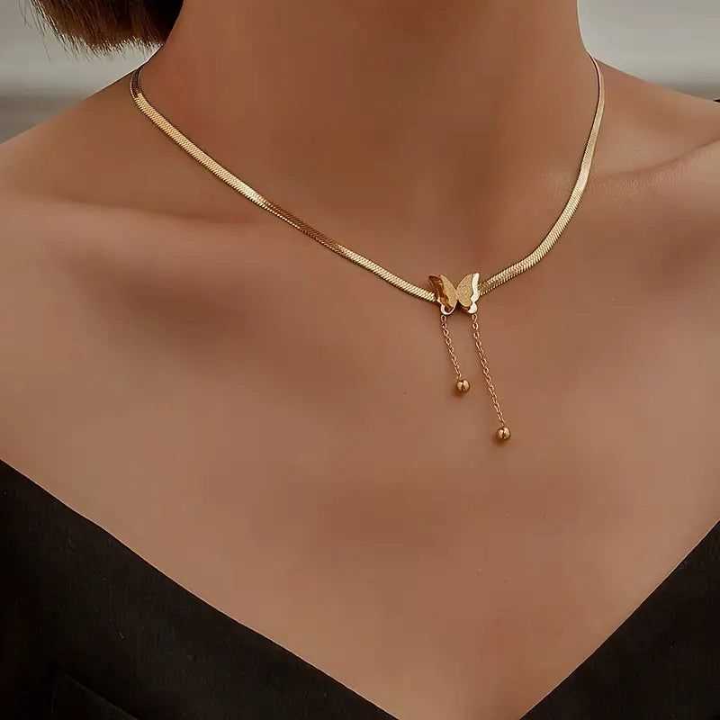 Steel butterfly pendant necklace featuring a detailed butterfly charm on a silver-tone chain, perfect for elegant jewelry styles.